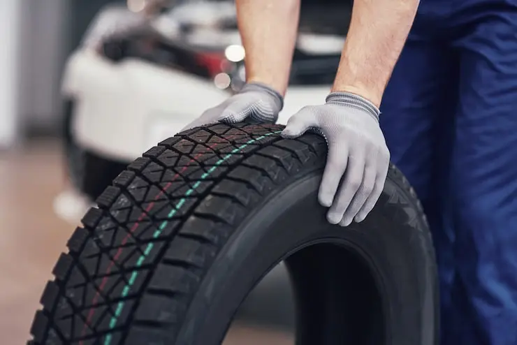 Tire manufacturing with rubber processing